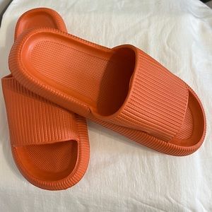 NWOT Authentic Orange Pillow Slides